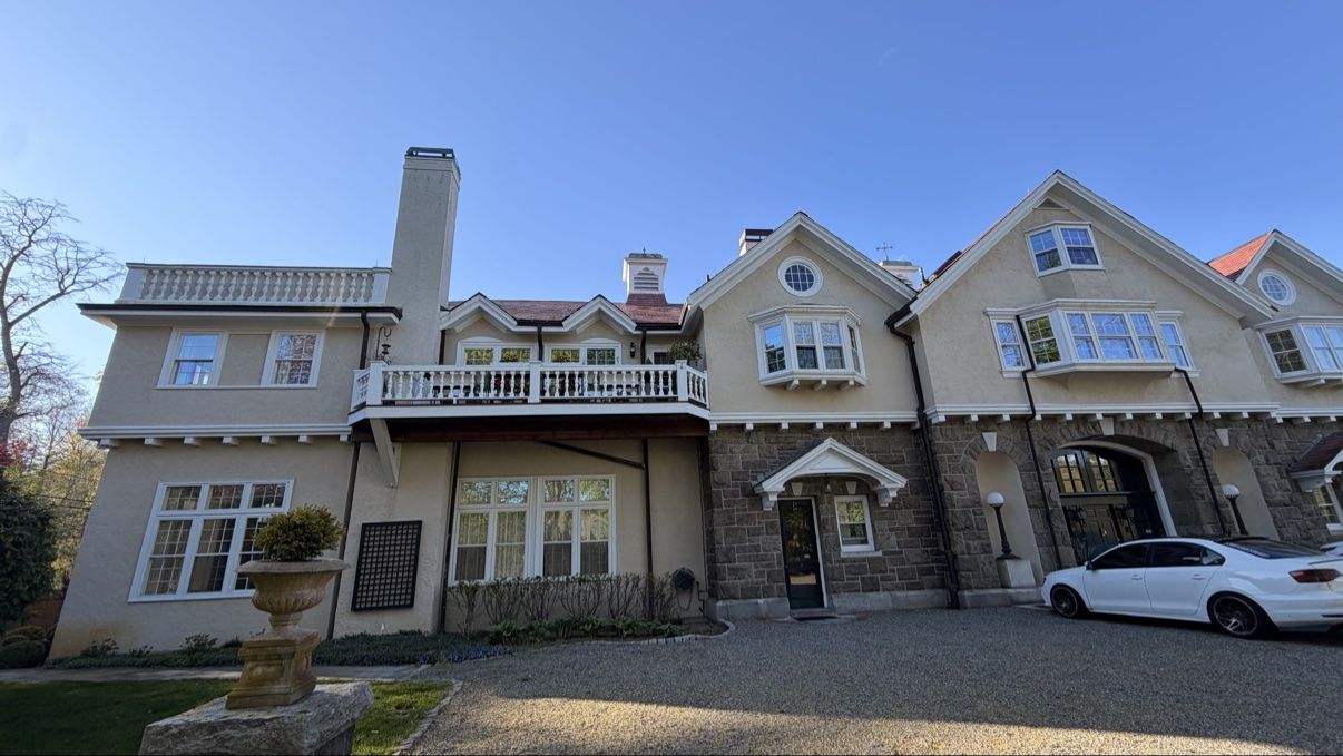 Stone and stucco estate home, exterior complete